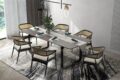 Dining room modern minimalist black white with a metal table, mica colored cushions, green tableware and floral decor styles